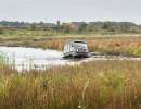 Вездеход преодолевает преграду, в виде воды